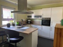Tim Boldorf Immobilien Bekond - Neuwertiges Einfamilienhaus mit Doppelgarage, Kaminofen, Wintergarten und Einbauk�che