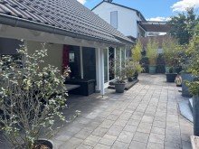 Tim Boldorf Immobilien Bekond - Neuwertiges Einfamilienhaus mit Doppelgarage, Kaminofen, Wintergarten und Einbauk�che