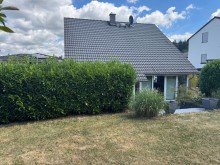 Tim Boldorf Immobilien Bekond - Neuwertiges Einfamilienhaus mit Doppelgarage, Kaminofen, Wintergarten und Einbauk�che