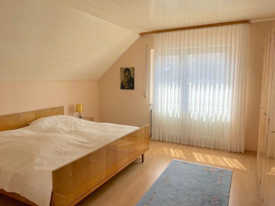 Schlafzimmer DG mit Schr�gen Einfamilienhaus Kenn